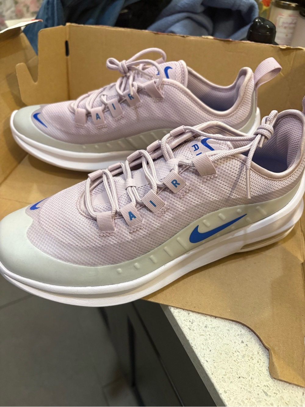 New Nike Air Max Axis athletic shoes in the "Iced Lilac/Soar/Photon Dust. Size 8